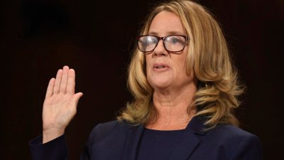 Christine Blasey Ford is sworn in to testify before the Senate Judiciary Committee on Capitol Hill in Washington, Thursday, Sept. 27, 2018. (Saul Loeb/Pool Photo via AP)